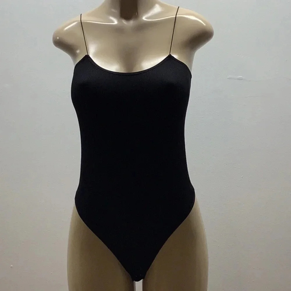 Eye Candy Size L/XL Black Ribbed Bodysuit. Preloved